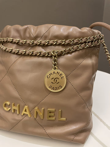 Chanel 23B 22 Mini Hobo Beige Calfskin