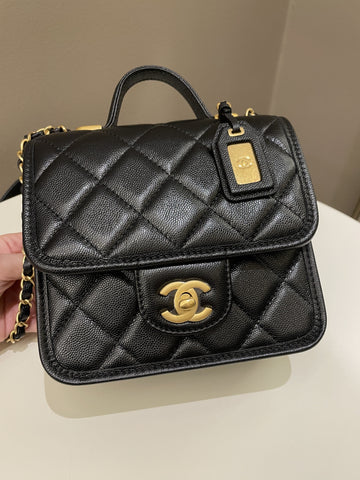 Chanel 22K Top Handle Flap Black Caviar