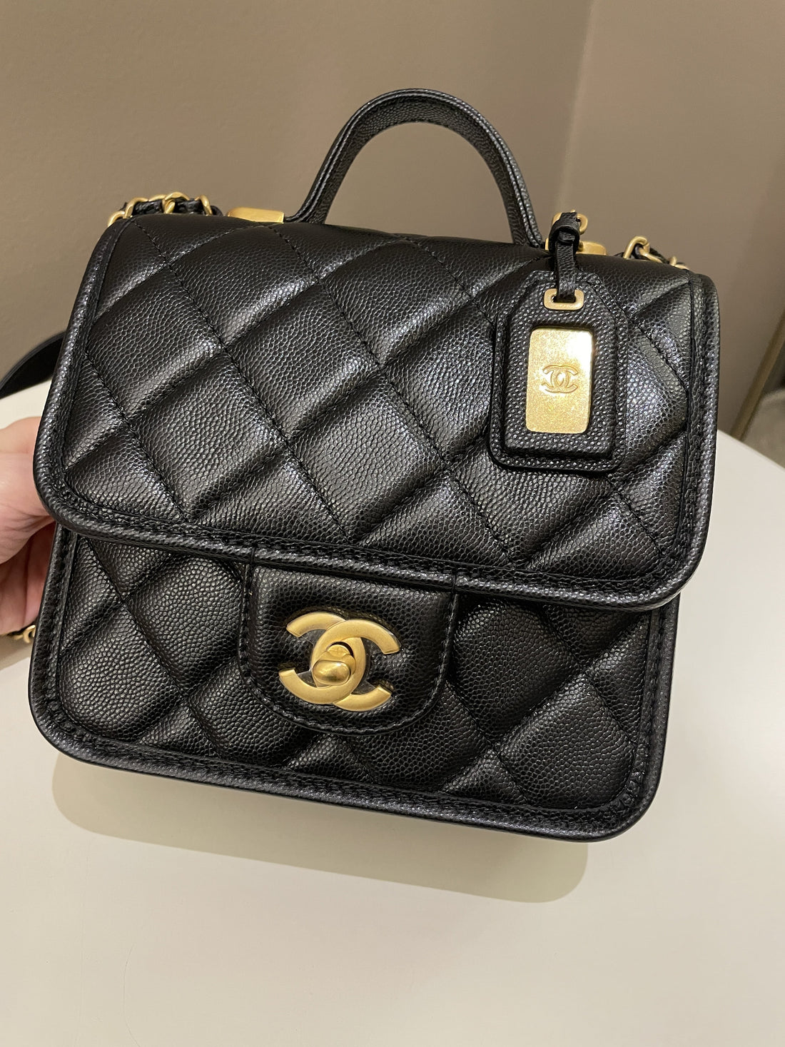Chanel 22K Top Handle Flap Black Caviar