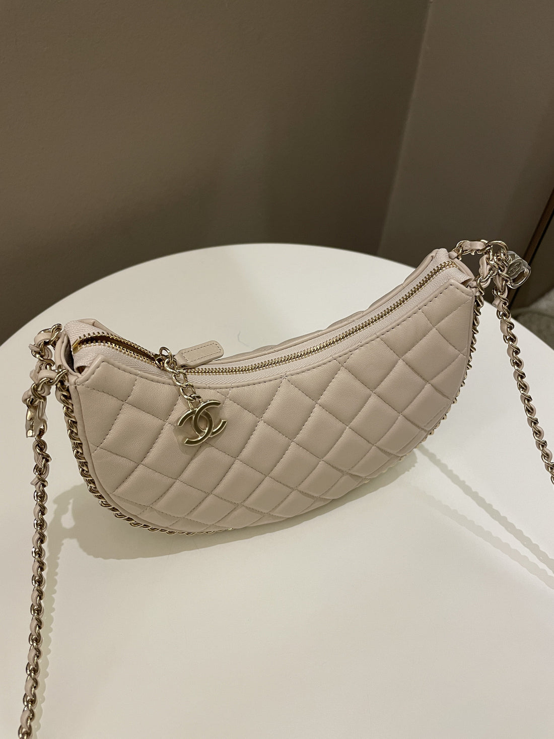 Chanel 23P Quilted Chain Around Hobo Bag Beige Lambskin