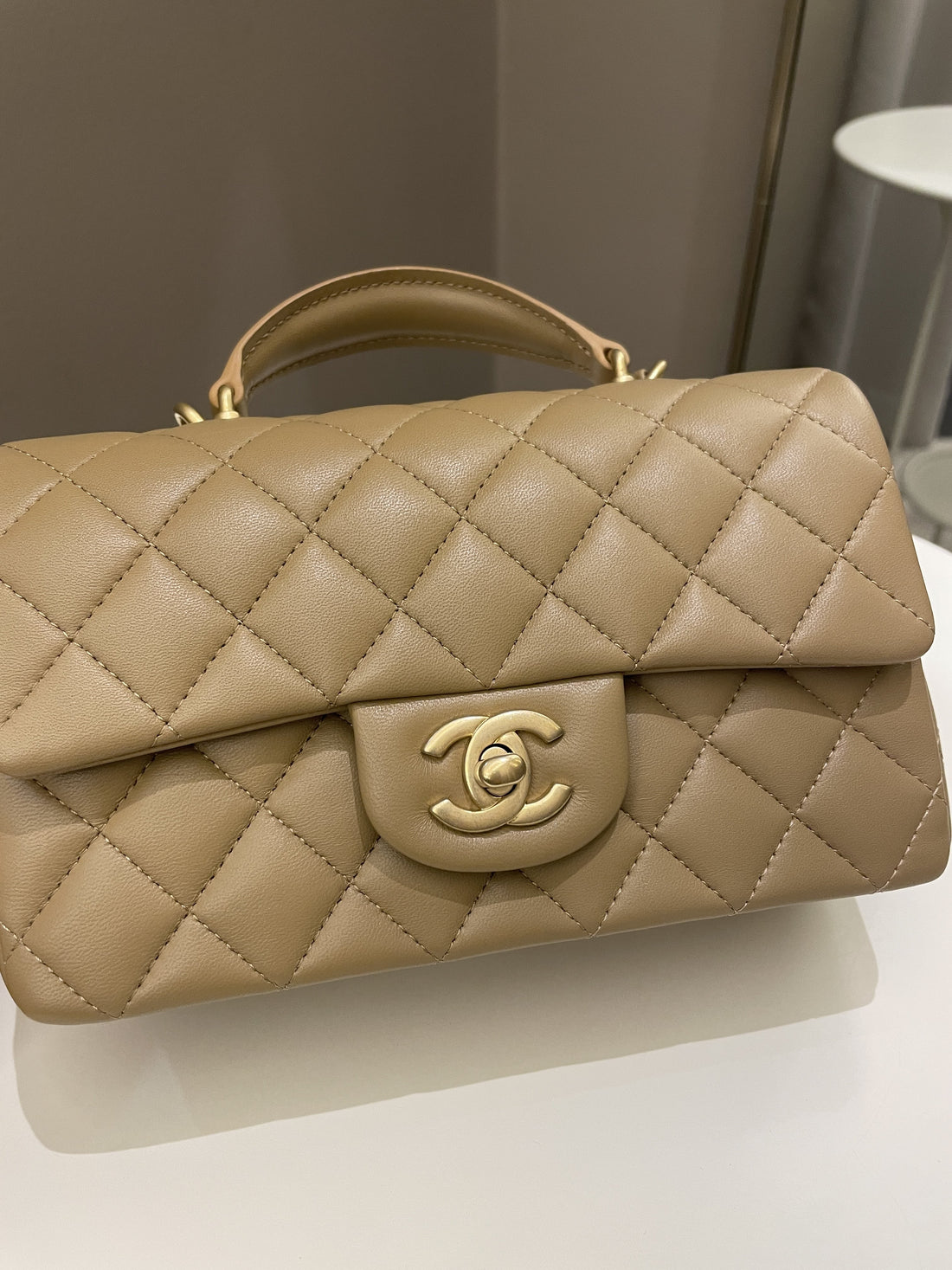 Chanel 22B Quilted Metal Top Handle Mini Rectangular Dark Beige Lambskin